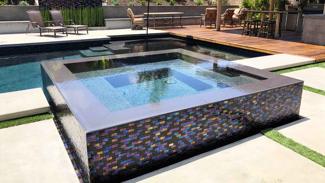 Nero Black 1x2 Glass Pool Tile Installed on the Spa