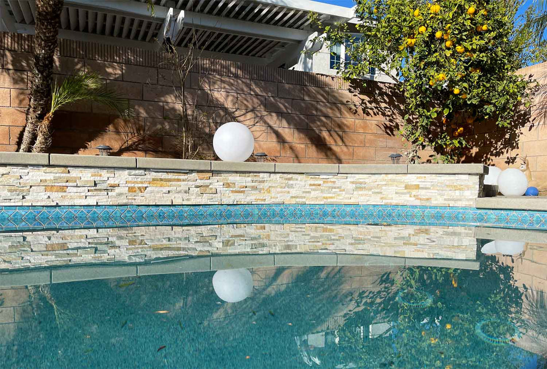 Aqua Marine 6x13 Waterline Tile Around The Swimming Pool