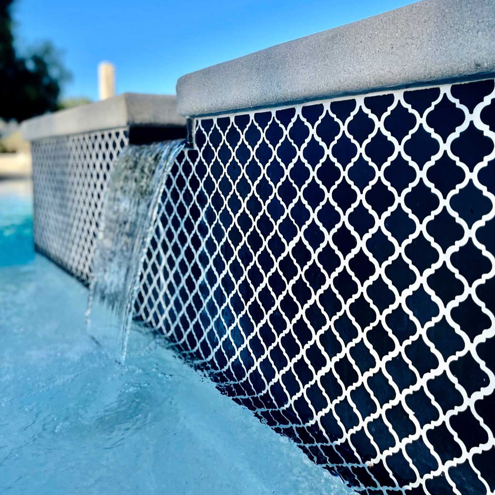 Black Matte Arabesque Lantern Pool Tile Installed on Raised Wall Spillway