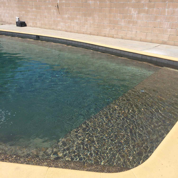 Bronze Pebble Stone Installed on Entire Pool