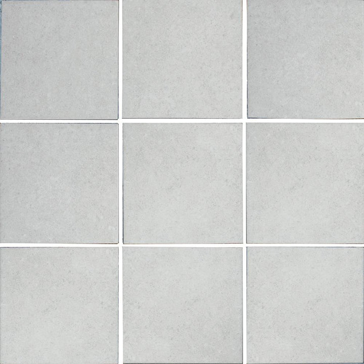 Grid of nine gray tiles with a subtle pattern