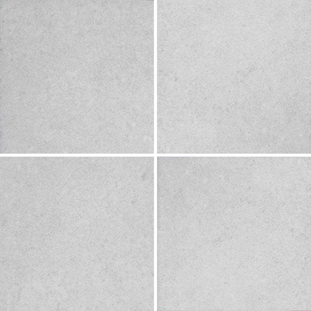 6x6 Aquatica District Series porcelain pool tile in soft white and light gray tones with a subtle concrete inspired texture for pools and spas
