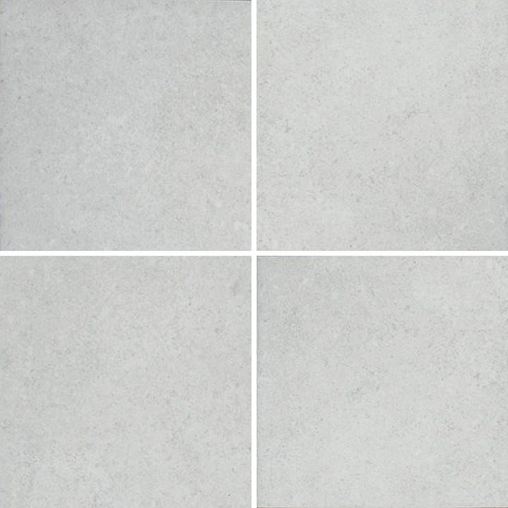 6x6 Aquatica District Series porcelain pool tile in soft white and light gray tones with a subtle concrete inspired texture for pools and spas
