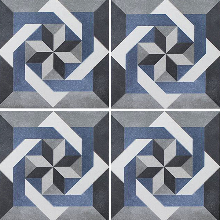 Aquatica Fleur Series 6x6 porcelain pool tile with an intricate geometric pattern in blue, gray, white, and charcoal tones, displayed in a repeating layout.