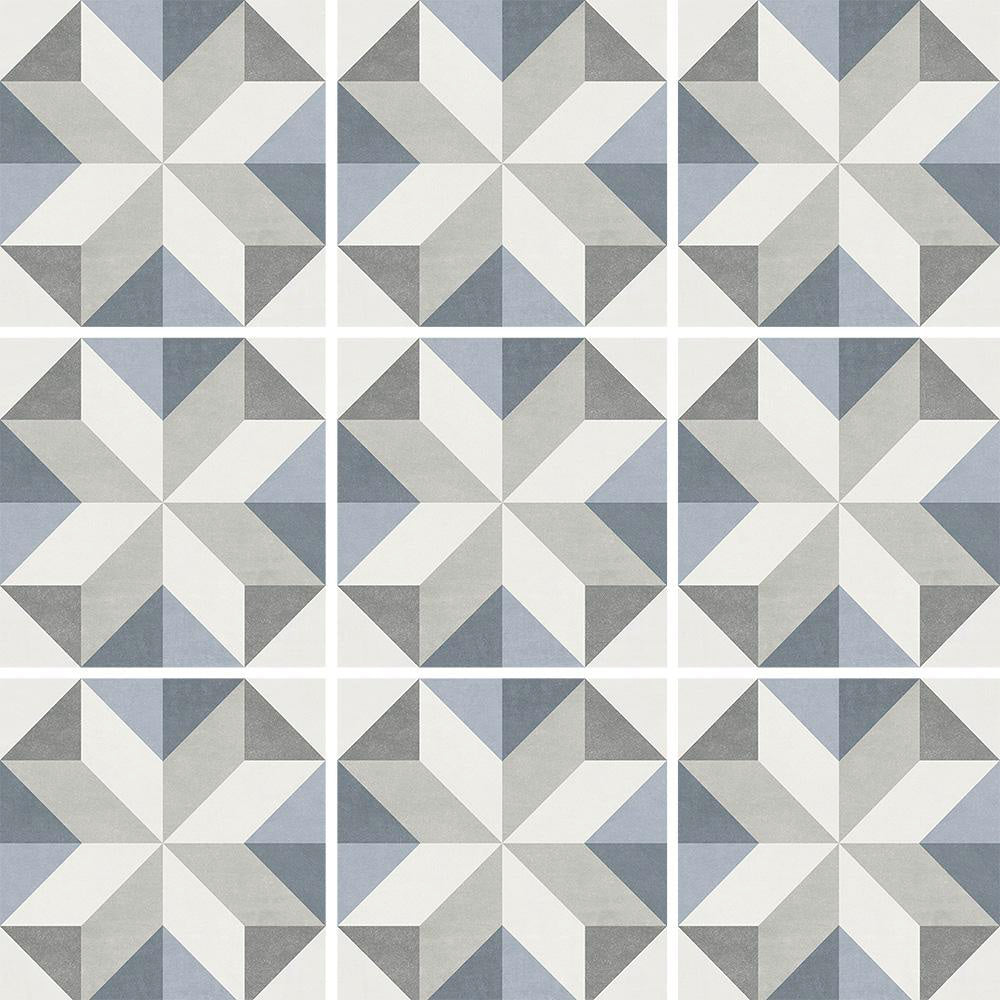 Geometric tile pattern with triangles in shades of gray and blue.