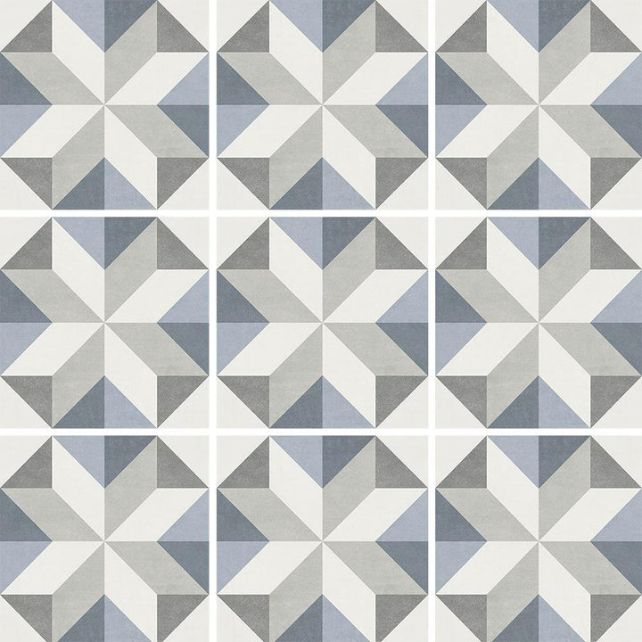 Geometric tile pattern with triangles in shades of gray and blue.