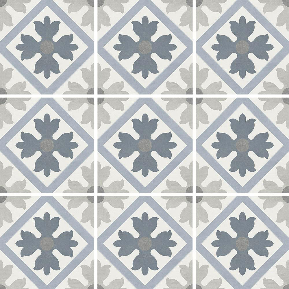 Patterned tiles with blue and gray floral design on a white background