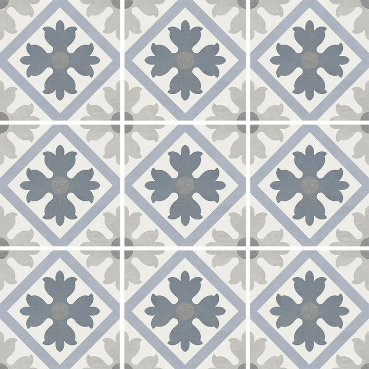 Patterned tiles with blue and gray floral design on a white background