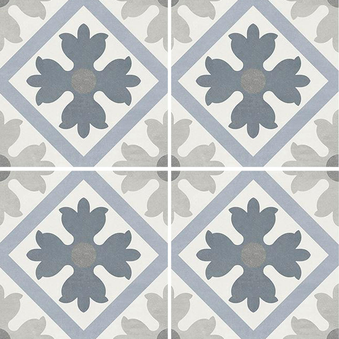 6x6 Aquatica Flore Series porcelain pool tile with decorative floral pattern in soft blue, gray, and white tones for pools and spas