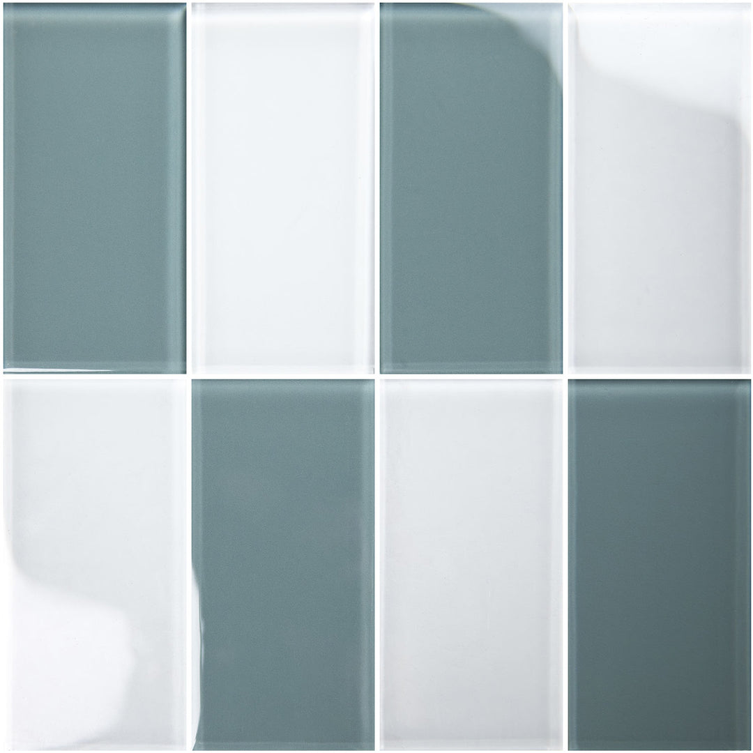 A 2x4 grid of glossy rectangular glass tiles in alternating muted blue-gray and white.