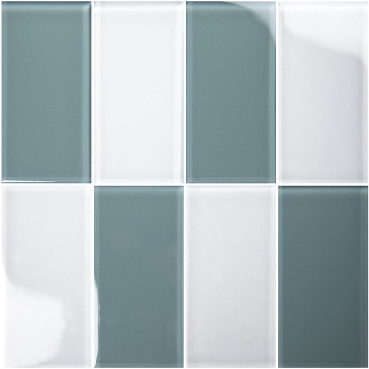 A 2x4 grid of glossy rectangular glass tiles in alternating muted blue-gray and white.