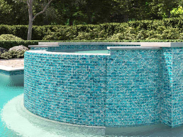 High Tide Teal 1x2 Glass Tile Around the Raised Spa Wall