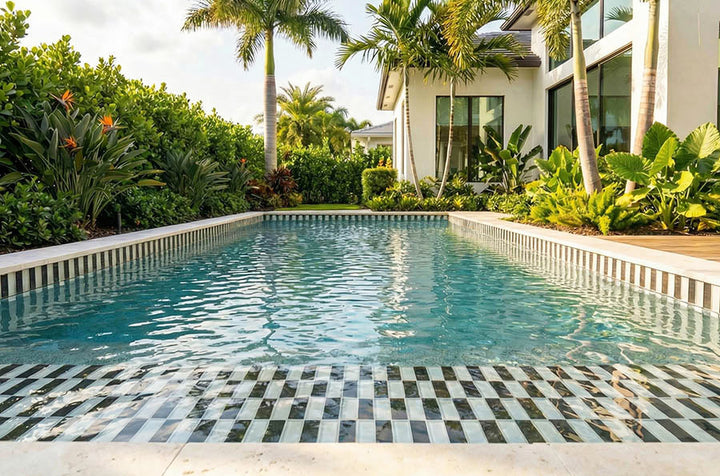 Jet Black 3x6 Glass Tile Around the Pool and Tanning Ledge