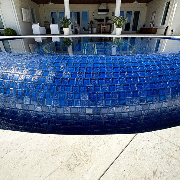 Lustrous Blue 1x1 Glass Tile Mosaics on Rounded Spa