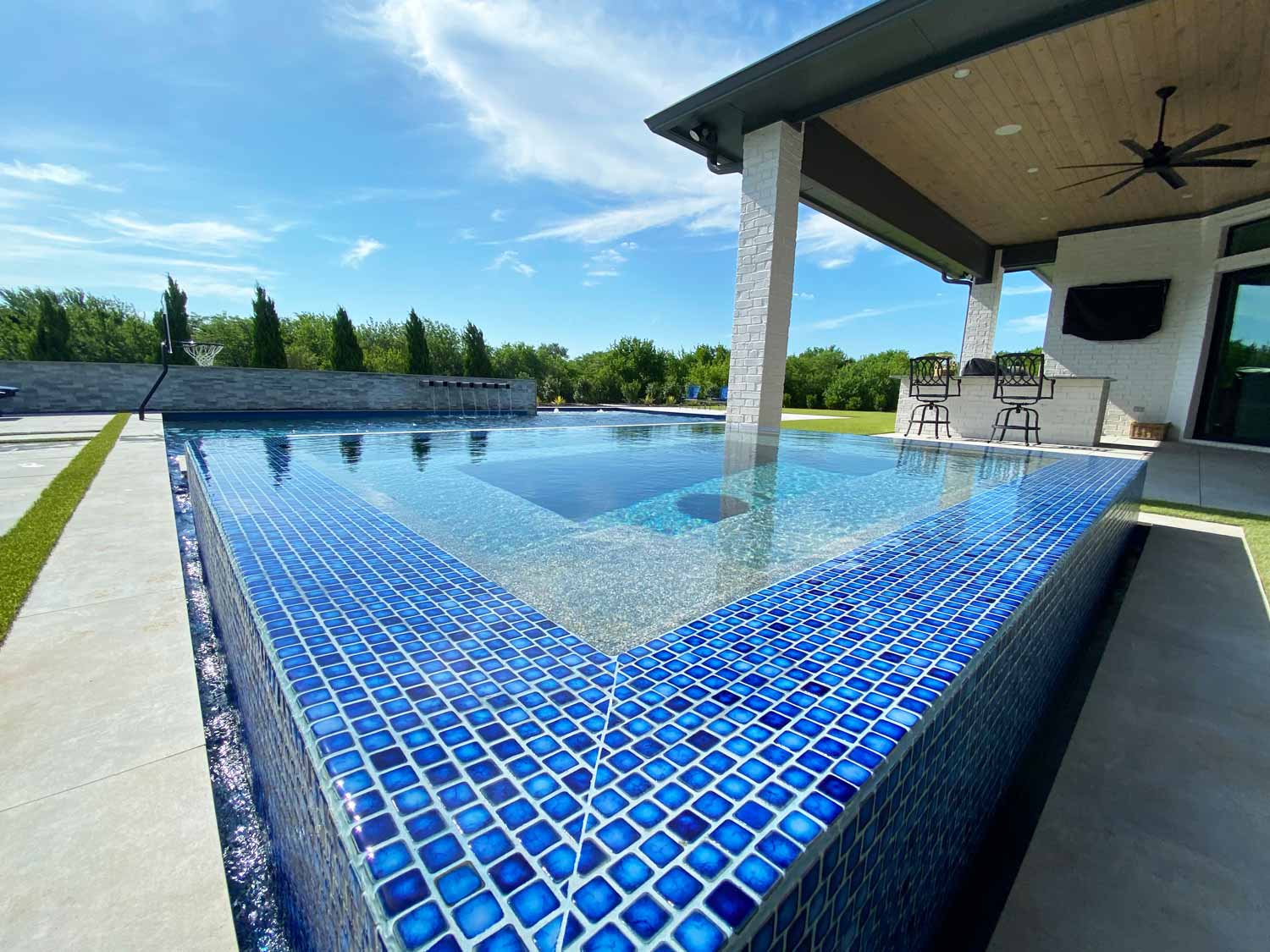 Marble Blue 1x1 Porcelain Tile Installed on Raised Spa