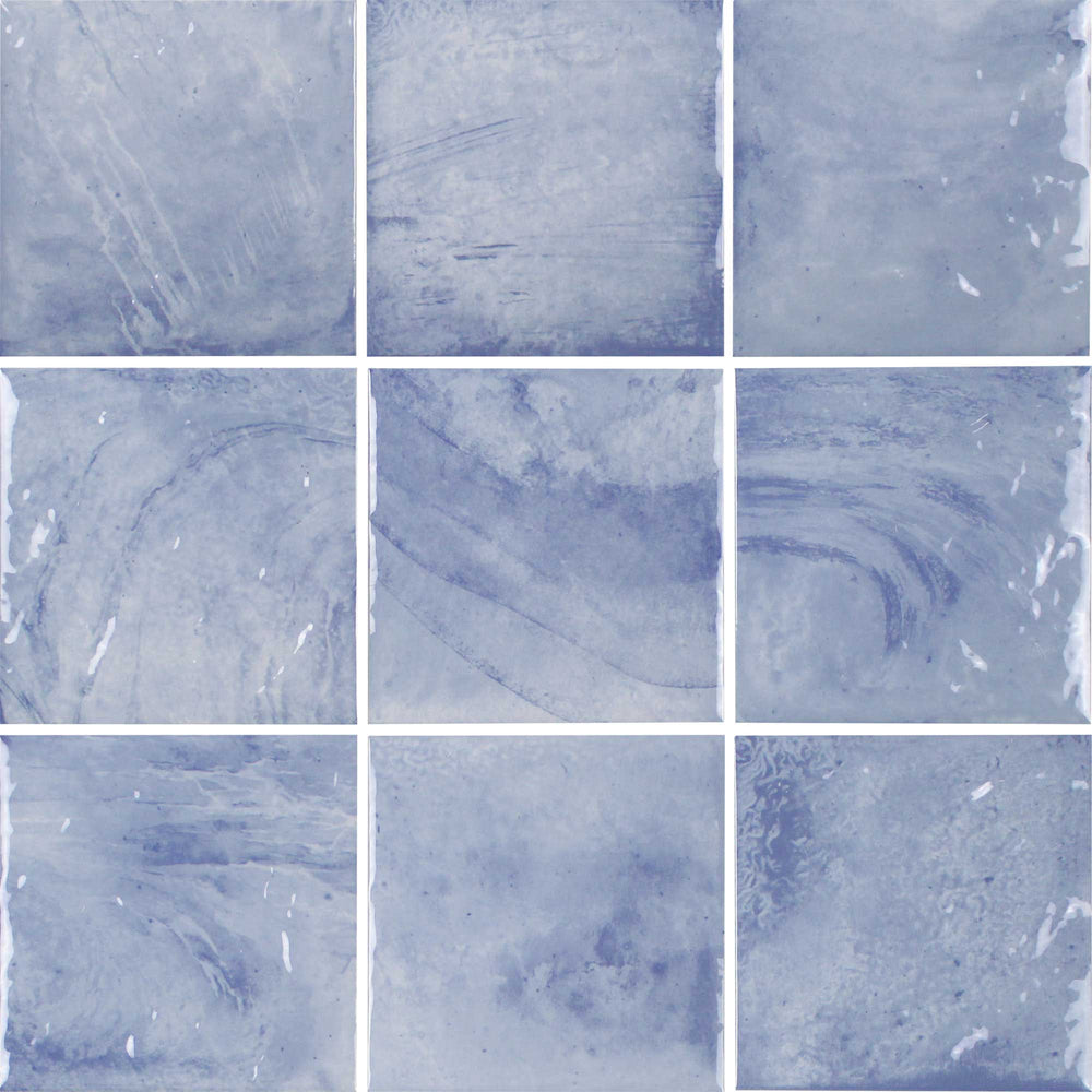 Nine square tiles with a blue marbled pattern