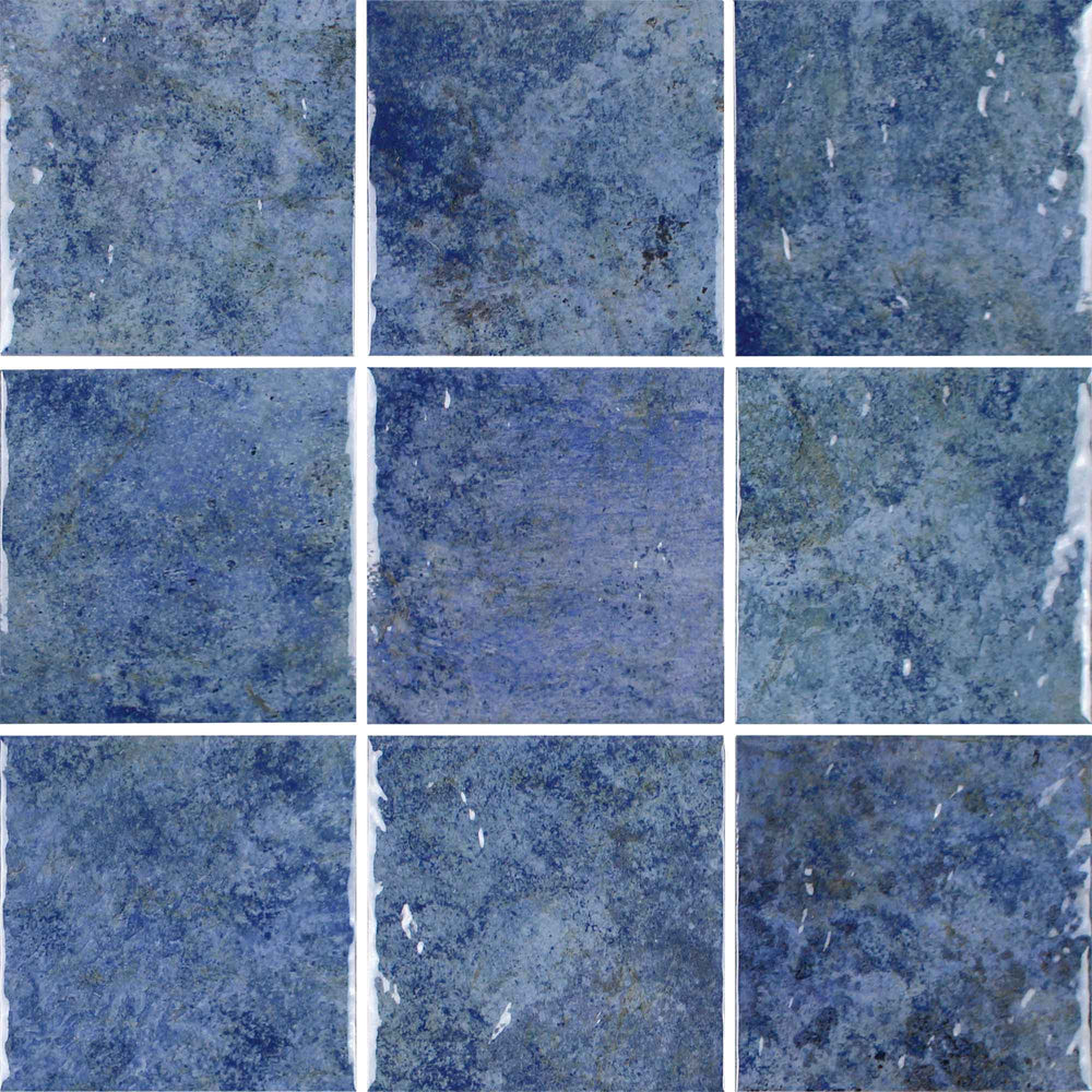 Nine square tiles with a blue textured pattern