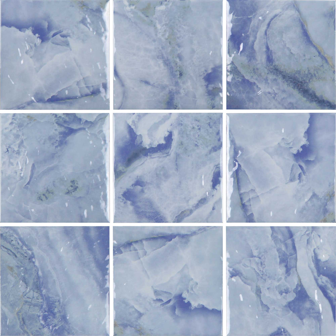 Nine square tiles with a blue and gray marbled pattern