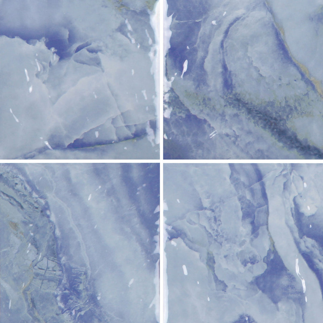 6x6 Aquatica Reef Series porcelain pool tile with soft blue tones and flowing stone like pattern
