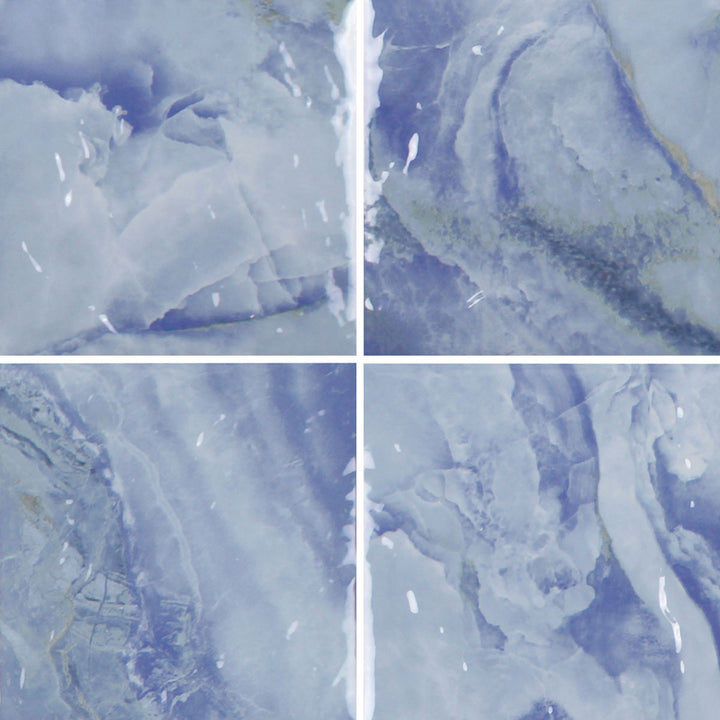 6x6 Aquatica Reef Series porcelain pool tile with soft blue tones and flowing stone like pattern
