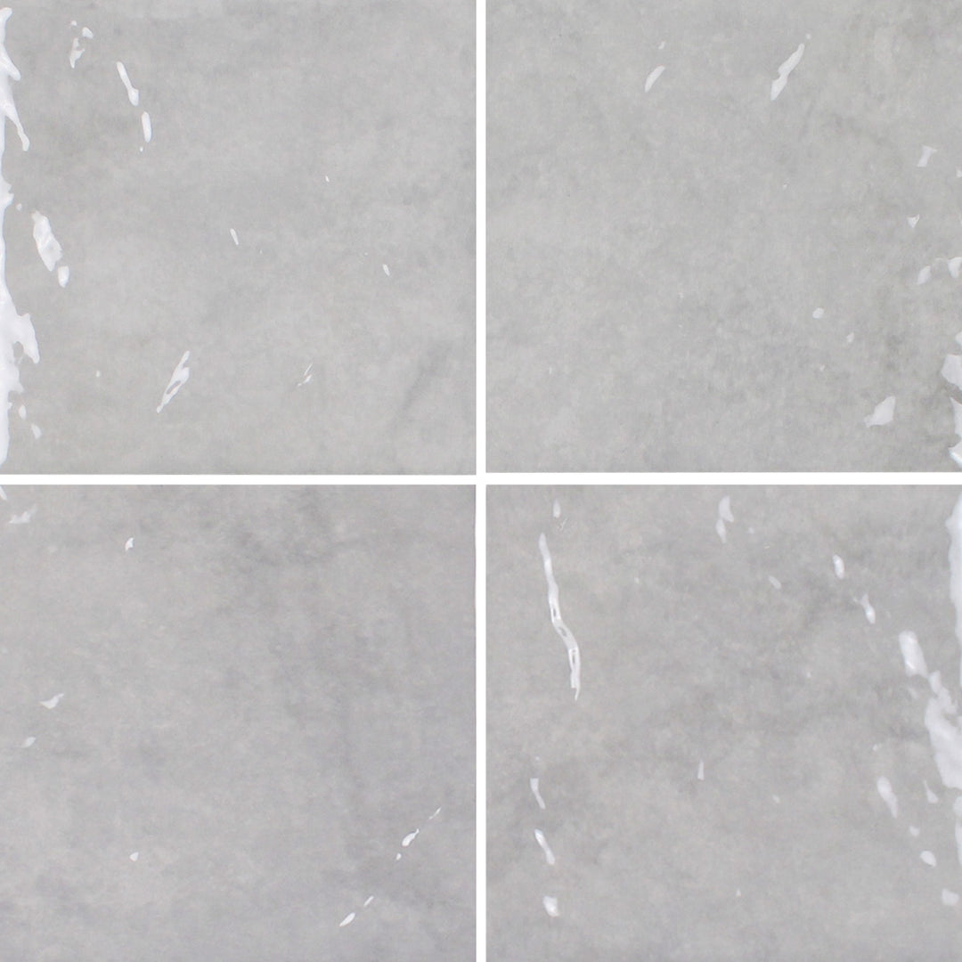 6x6 Aquatica Reef Series porcelain pool tile with soft light gray tones and subtle pearlescent variation
