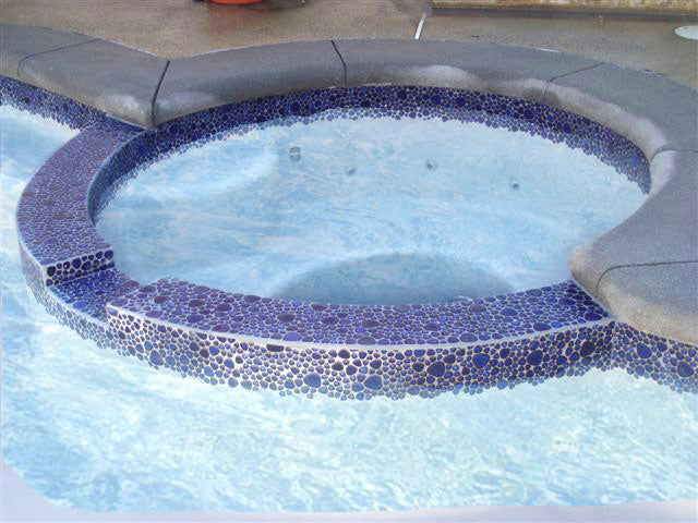 Royal Blue Pebble Stone Installed on a Spa