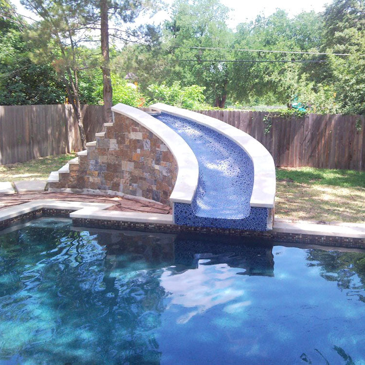 Royal Blue Pebble Stone Installed on a Swimming Pools Slide