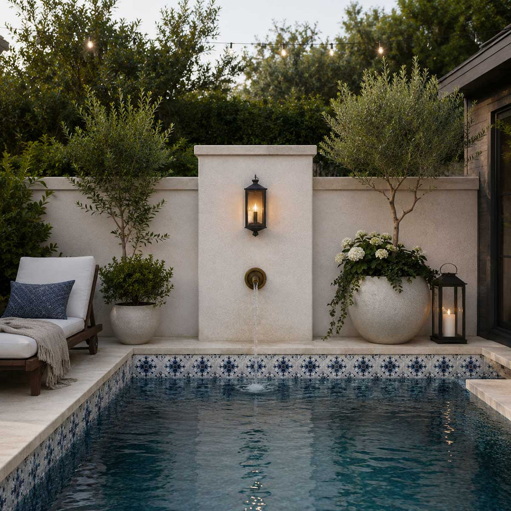 Serene Mediterranean courtyard pool at dusk Cayman Blue tile