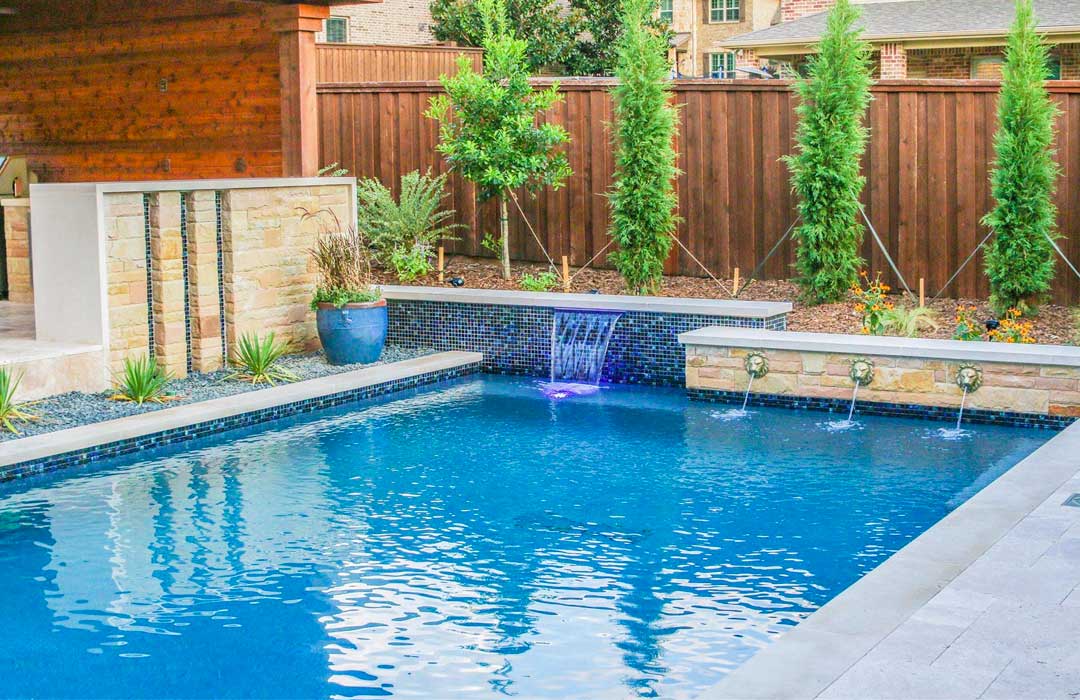 Summer Blue 1x1 porcelain pool tile in a swimming pool