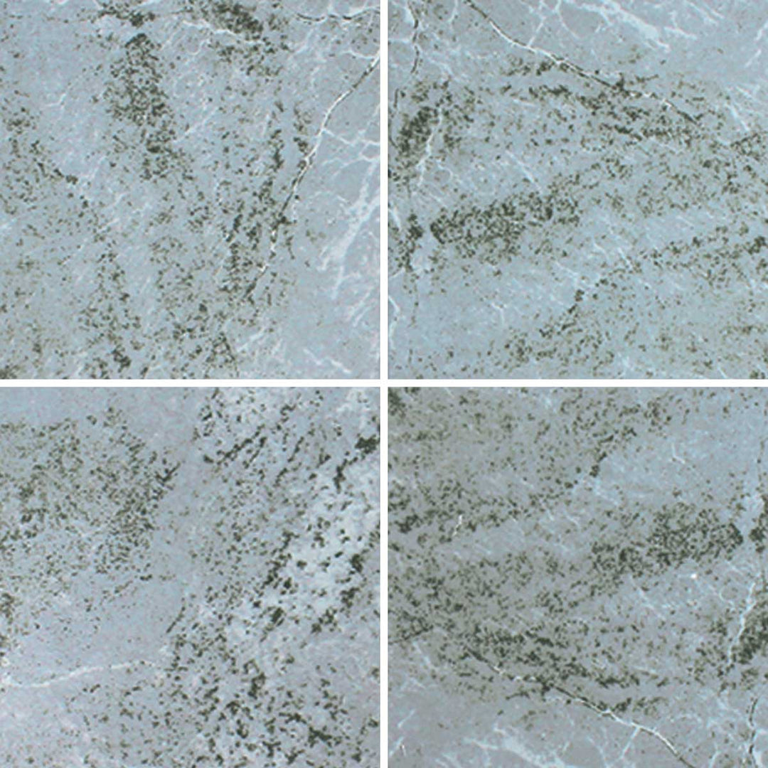 Aquatica Waves II Series 6x6 porcelain pool tile with a light blue and gray stone-inspired pattern, subtle texture, and natural variation, shown in a repeating layout.