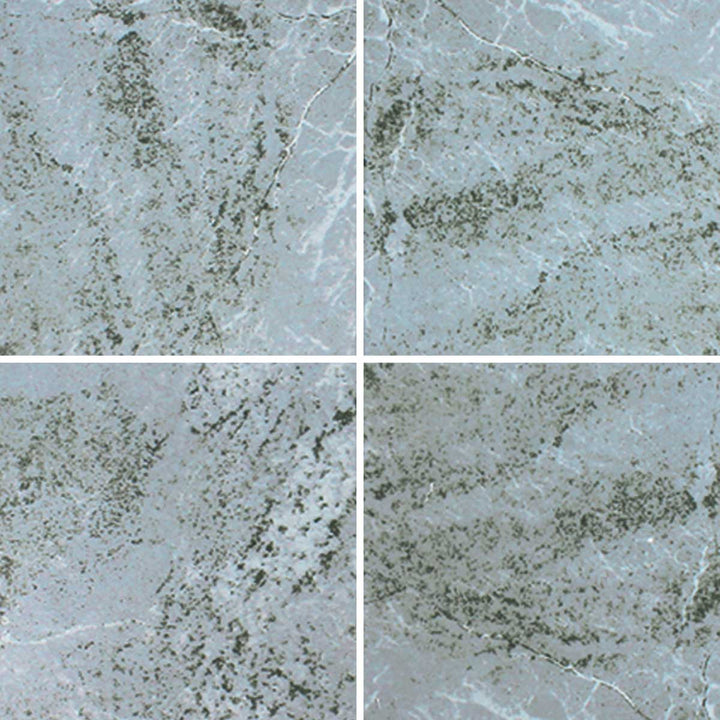 Aquatica Waves II Series 6x6 porcelain pool tile with a light blue and gray stone-inspired pattern, subtle texture, and natural variation, shown in a repeating layout.