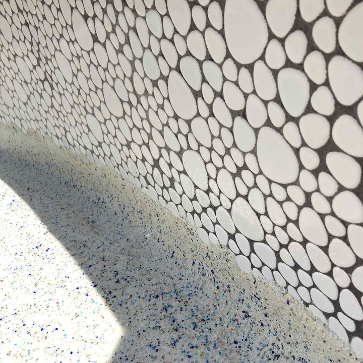 White Pebble Stone Porcelain Tile Around Swimming Pool