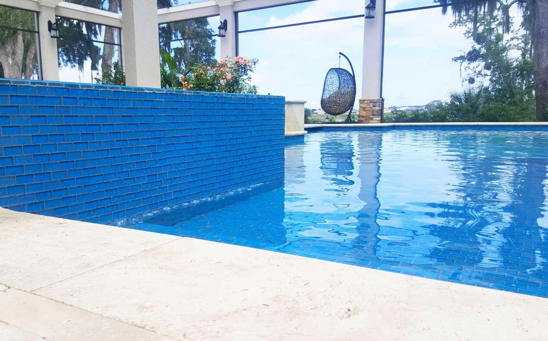 Azure 1x2 Iridescent Glass Pool Tile on Spillway Spa and Waterline