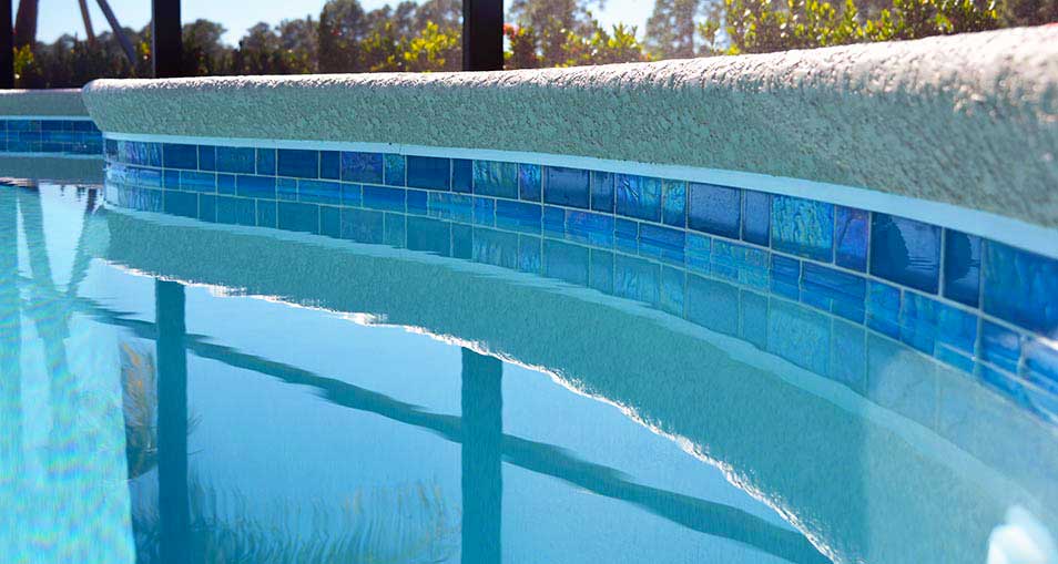 Azure Iridescent Glass Tile Installed on The Pools Waterline
