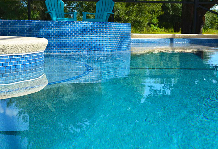 Azure Translucent 1x2 Glass Pool Tile on Raised Wall Spa